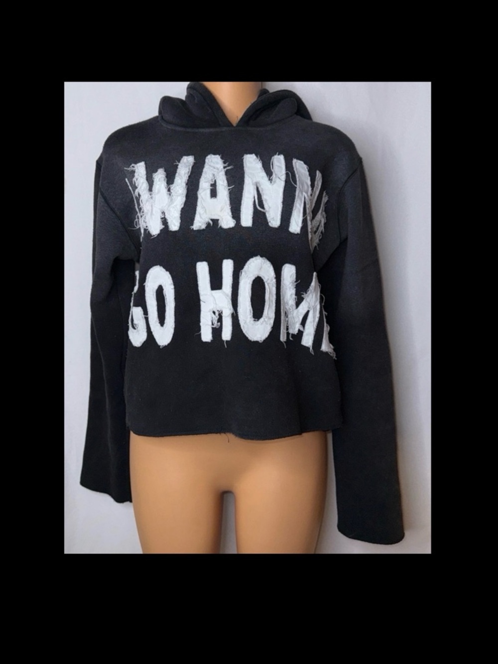 Black Cropped Hoodie with White 'Wanna Go Home' Graphic